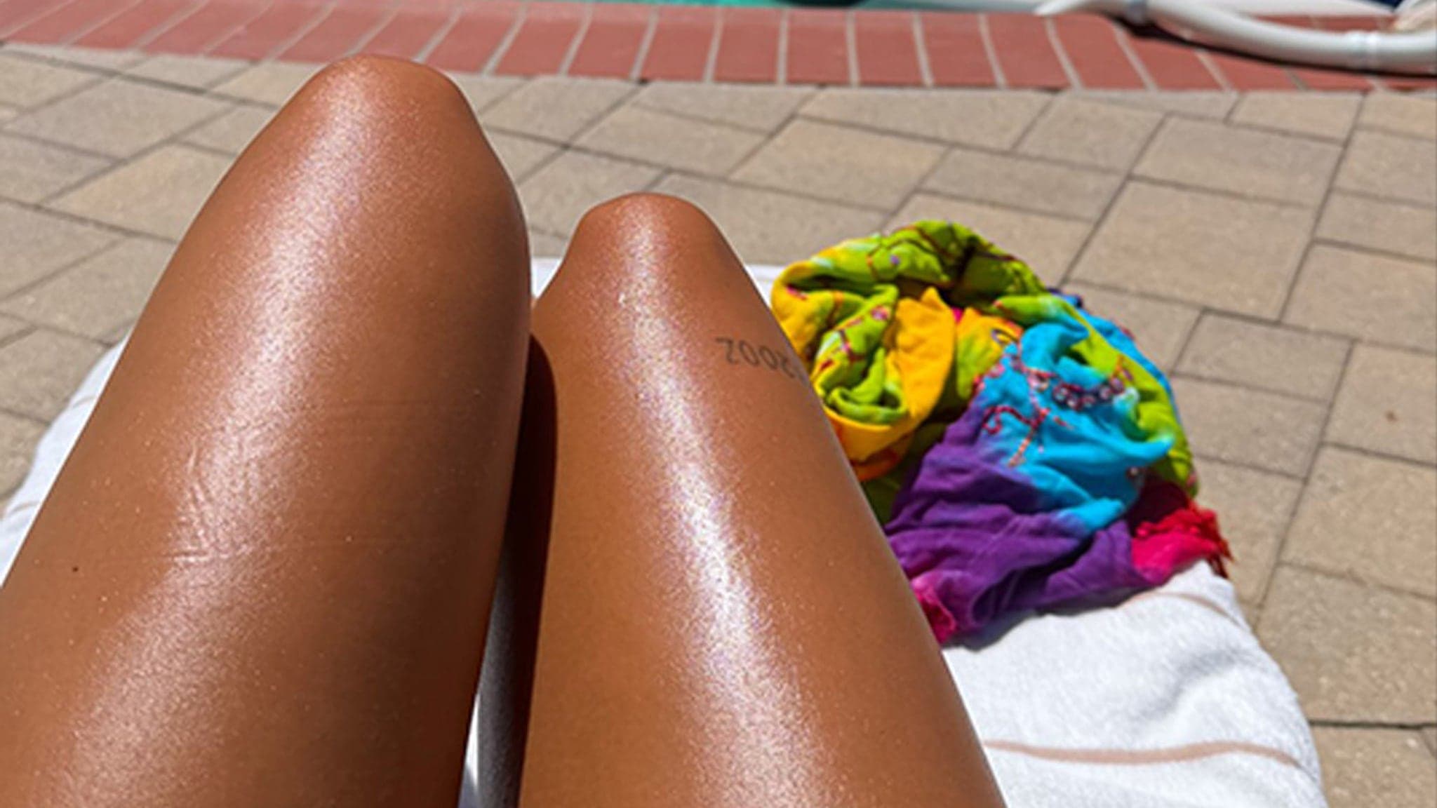 Unveiling the Sizzling Star of the Summer: Guess the Toasty Influencer's Legs!
